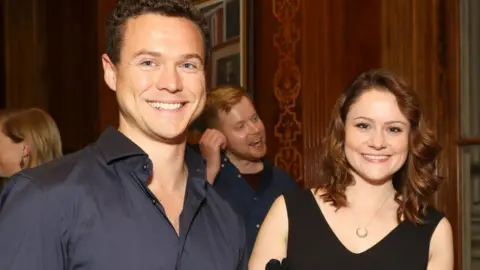 Getty Images Louise and her husband James at an event