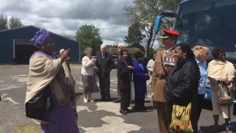 BBC Members of the African-American community gather