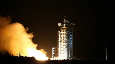 China Daily/Reuters Rocket containing the world's first quantum satellite is launched in Jiuquan, Gansu Province, China, 16 August 2016.