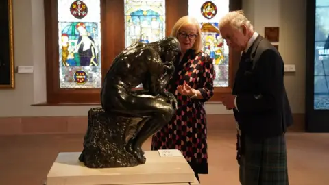 PA Media King Charles and Auguste Rodin's The Thinker