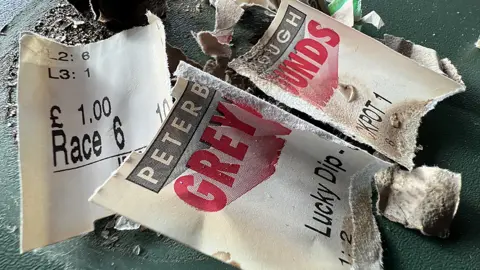 Steve Hubbard/BBC burned betting slips