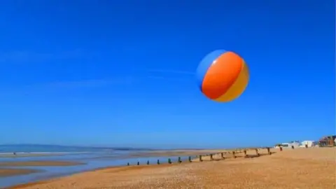 Peter and Leah Beach ball