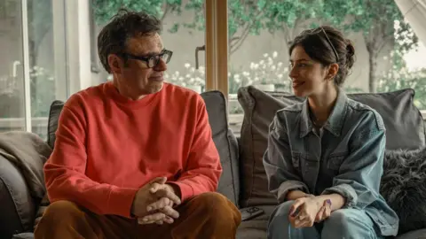 Disney Jemaine Clement and Yali Topol Margalith as Steve and Izzy 