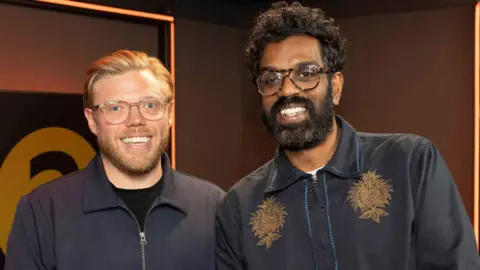 PA Media Rob Beckett and Romesh Ranganathan in the BBC Radio 2 studio