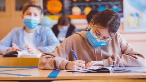 Getty Images Pupils wearing masks
