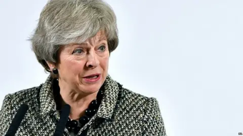 PA Theresa May speaking at an event to mark publication of 10-year NHS plan