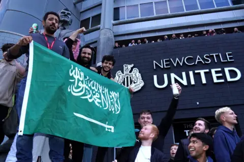 PA Media Fans with Saudi flag