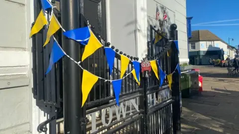 Stuart Howells/BBC AFC Sudbury bunting on a gate