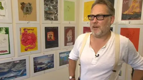 BBC Vic Reeves with his artworks