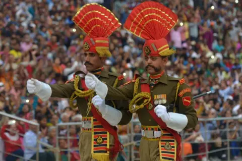 Getty Images The daily closing ceremony at the India-Pakistan Wagah border crossing near Amritsar.