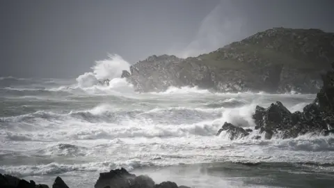 Getty Images Waves crashing off the coast of Holyhead