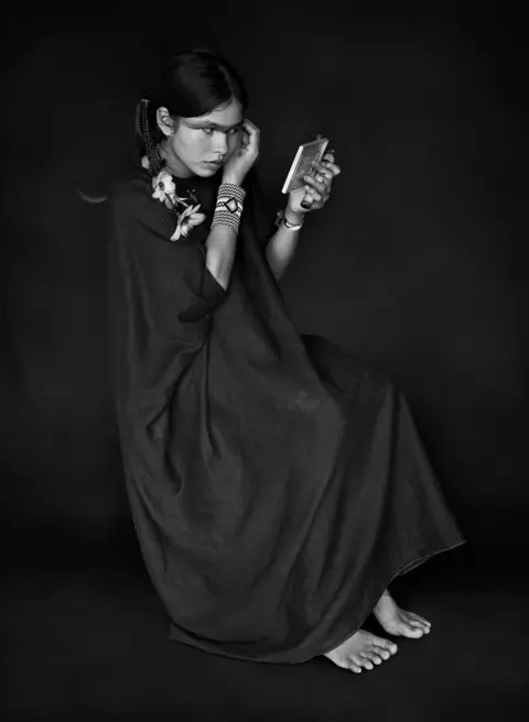 Sebastião Salgado Black and white portrait of a young woman