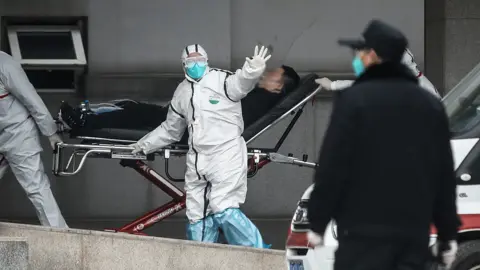 Getty Images Medical staff at Jin Yintan Hospital, Wuhan - 17 January 2020