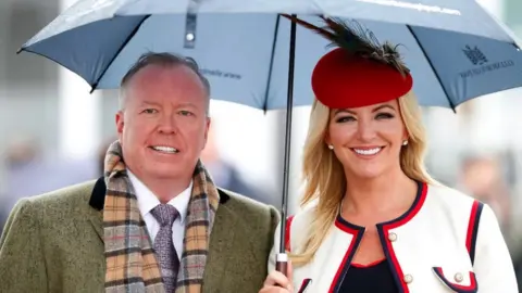 Getty Images Doug Barrowman and Baroness Michelle Mone photographed at the Cheltenham Festival in 2019