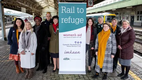 Tom Wren Representatives from Women's Aid, GWR and Southeastern and other domestic violence workers gathered for the launch on Wednesday