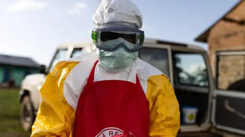 Ugandan Red Cross workers with PPE