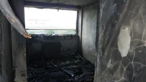 LFB Smoke-damaged room