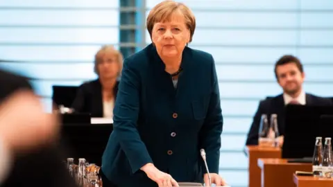 EPA German Chancellor Angela Merkel arrives for the weekly meeting of the German Federal cabinet at the Chancellery in Berlin, Germany, 22 April 2020