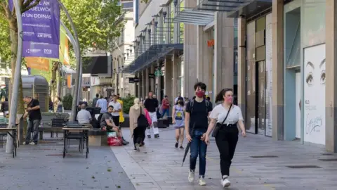 Getty Images People shopping in Cardiff