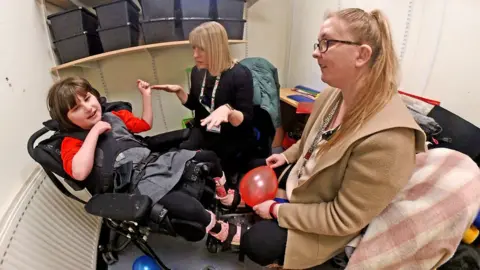 BBC/Dan Nelson A visual-impairment session taking place in a former resource cupboard