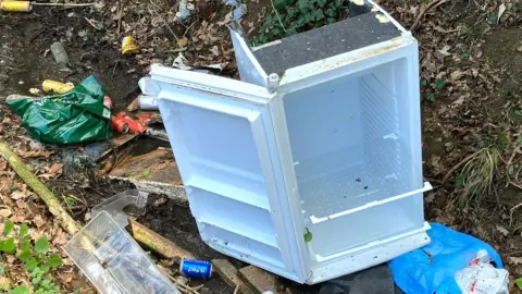 Andrew Sinclair/BBC Fly tipping