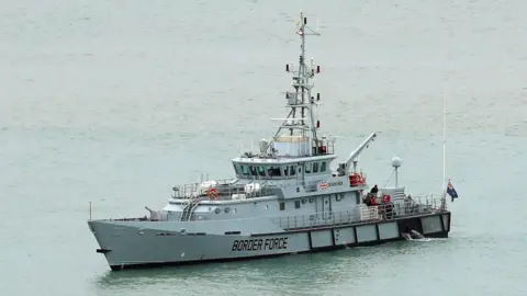 PA Media HMC Searcher, one of four cutter ships patrolling UK waters, at the Port of Dover in Kent