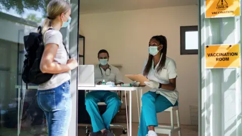 Getty Images File image of person getting a vaccine