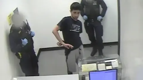 Met Police Danyal Hussein in custody