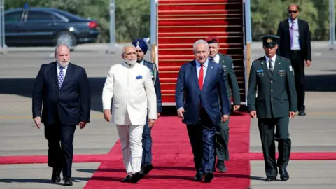 Reuters Israeli Prime Minister Benjamin Netanyahu (2nd R) welcomes Indian Prime Minister Narendra Modi (2nd L) during an official welcoming ceremony upon his arrival in Israel at Ben Gurion Airport, near Tel Aviv, Israel 4 July 2017