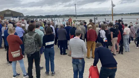 Jenny Kirk/BBC Protestors by Mistley Quay