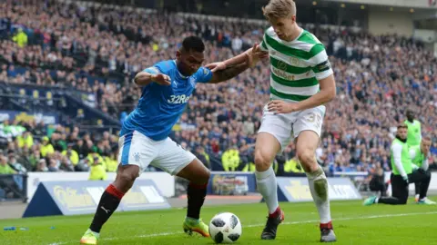 Getty Images Alfredo Morelos of Rangers is challenged by Kristoffer Ajer of Celtic during the Scottish Cup Semi Final match between Rangers and Celtic at Hampden Park on April 15, 2018