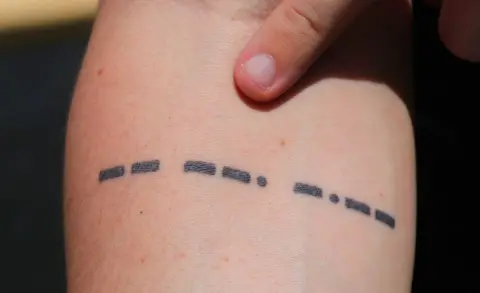 BBC/Jonathan Amos Titanic tattoo: "MGY" in morse code - Titanic's radio call sign