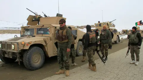 Reuters Afghan national army soldiers at site of crash