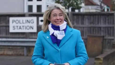 PA Media Conservative candidate Anna Firth leaves Highlands Methodist Church Hall after casting her vote in the Southend West by-election to select a successor to Sir David Amess