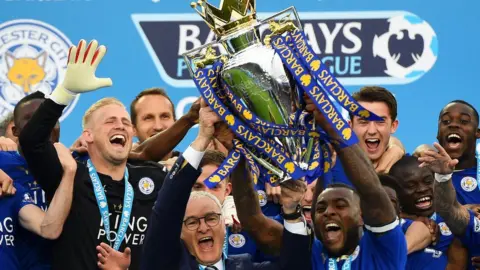 Getty Images Leicester City lift the Premier League trophy