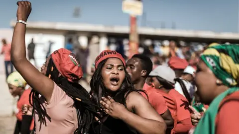 Getty Images Workers, organised by South Africa's largest union, the Congress of South African Trade Unions, protest on May 1