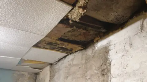 The Oakwood Broken tiles and damp