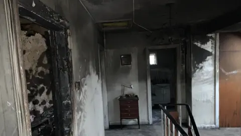 Northamptonshire Fire and Rescue Service Fire damaged home