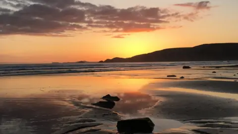 Sue Thomas  Sunset over Newgale beach