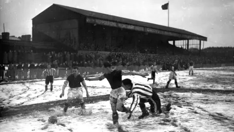 London Express/Getty Winter football game in 1937/38 season