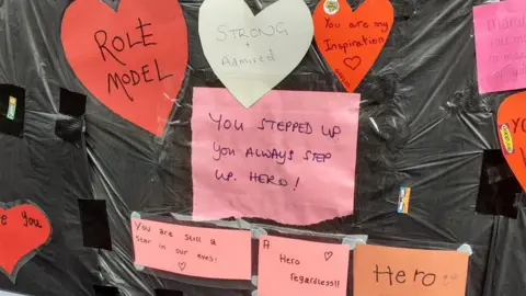 Messages posted on the defaced mural