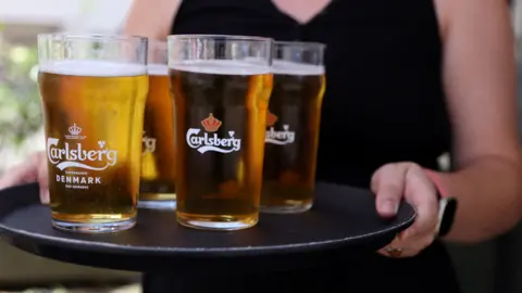 Reuters Pints of Carlsberg lager