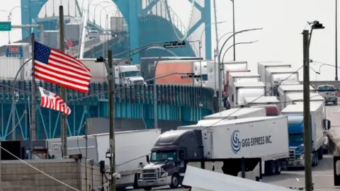 Getty Images Trucks at the US-Canada border in Michigan