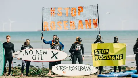PA Media Surfers protest new drilling proposals at Rosebank oilfield