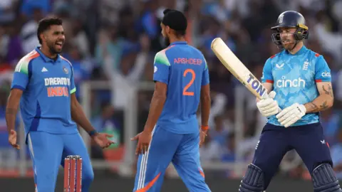 Phil Salt of England shows his frustration after being dismissed by Arshdeep Singh (c) of India during the 3rd ODI match between India and England at Narendra Modi Stadium