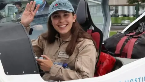 Zara Rutherford in the cockpit of her plane