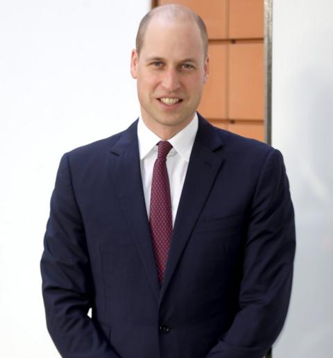 Prince William sports shaved head on royal visit - BBC News