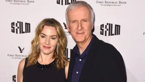 Getty Images Kate Winslet and James Cameron