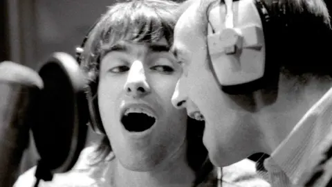 Michael Spencer Jones Liam Gallagher singing with Bonehead