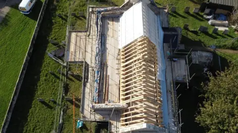 Shaun Whitmore/BBC Aerial view of church